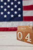 Date blocks arranged against American flag background