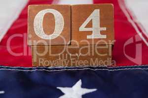 Dates blocks on American flag with 4th july theme
