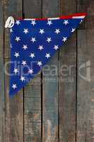 Folded American flag on wooden table