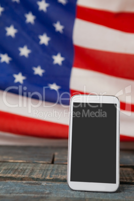 Digital tablet on American flag