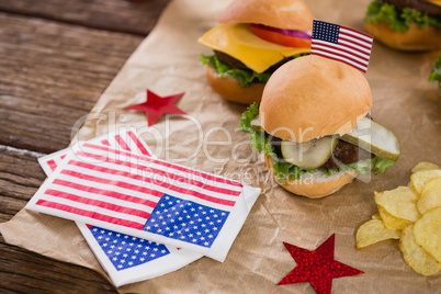 Burger and potato chips decorated with 4th july theme