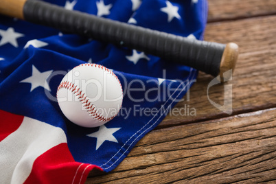 Baseball and bat on an American flag