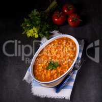 fish with vegetables in tomato sauce