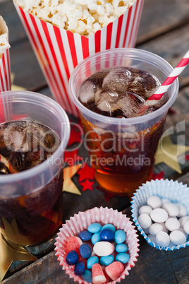 Popcorn, confectionery and drink with 4th july theme