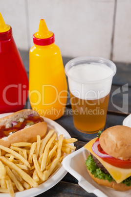Drink and snacks on wooden table