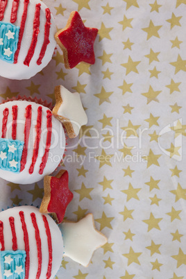 Close-up of decorated cupcakes arranged on table