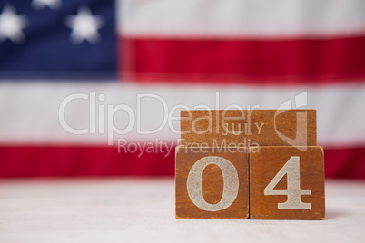 Date blocks arranged against American flag background