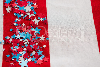 Star shape decoration arranged on American flag