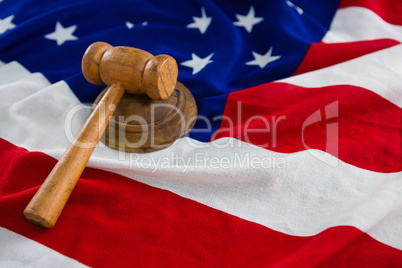 Close-up of gavel on American flag