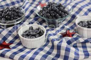 Black berries in bowls with 4th july theme