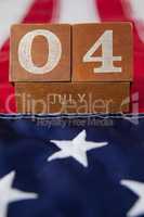 Dates blocks on American flag with 4th july theme