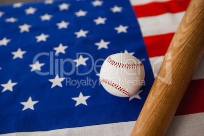 Baseball bat and ball on American flag