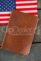 Visa and American flag on a wooden table