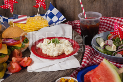 Snacks and cold drink decorated with 4th july theme