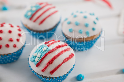 Close-up of cupcakes decorated with 4th july theme