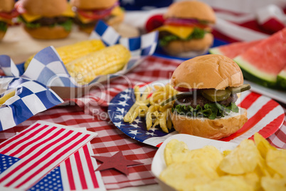 Burger and potato chips with 4th July theme