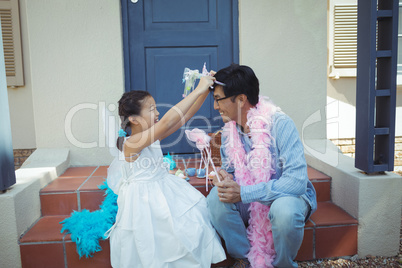 Father and daughter in fairy costume