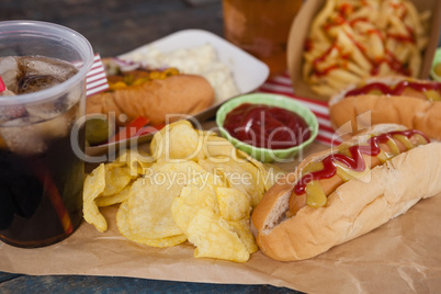 Snacks and cold drink on brown paper