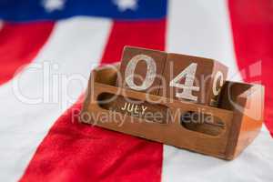 Date blocks on American flag with 4th july theme