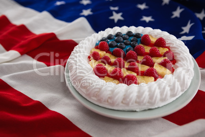 Fruitcake served in plate on American flag