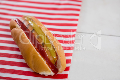 Hot dog on wooden table with 4th july theme