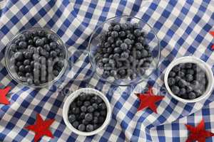 Black berries in bowls with 4th july theme