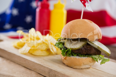 Close-up of burger on wooden board