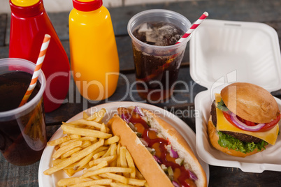 Drink and snacks on wooden table