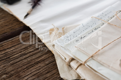 Tied up legal documents arranged on table