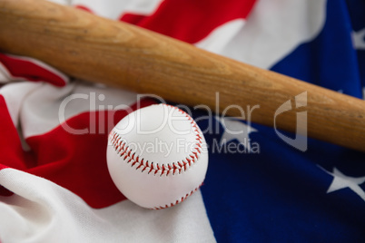 Baseball bat and ball on American flag