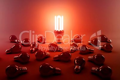 Digital composite image of illuminated energy efficient lightbulb by bulbs