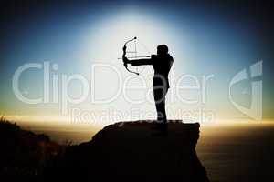 Composite image of silhouette businessman taking aim with bow and arrow