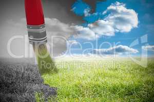 Composite image of digitally generated image of red paintbrush