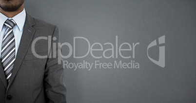 Composite image of businessman standing against white background Composite image of businessman standing against white background