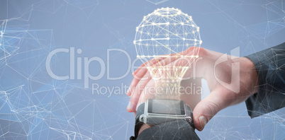 Composite image of businessman checking smart watch