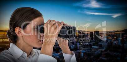 Composite image of close up of confident businesswoman looking through binoculars