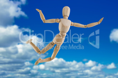 Composite image of 3d illustration of carefree wooden figurine jumping in air
