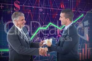 Composite image of businessmen shaking hands and exchanging money