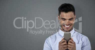 Composite image of happy businessman using mobile phone
