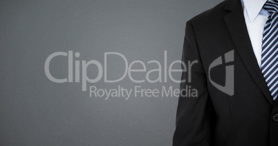 Composite image of mid section of businessman wearing full suit
