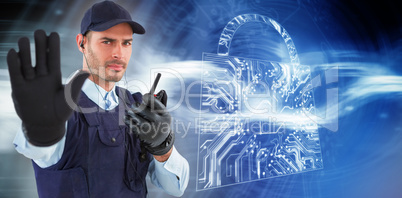 Composite image of confident security officer making stop gesture