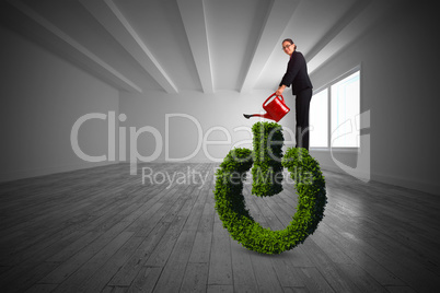 Composite image of businesswoman using red watering can