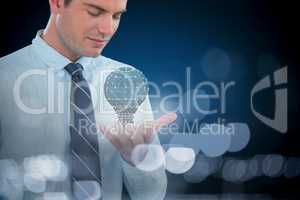 Composite image of businessman using futuristic mobile phone