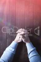 Cropped image of man praying