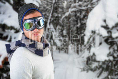 Composite image of man wearing aviator goggles against white background