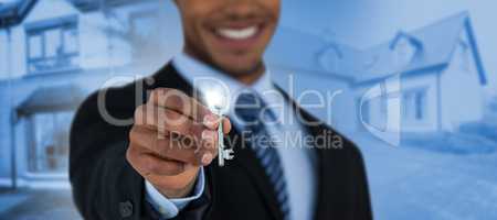 Composite image of mid section of businessman showing new house key