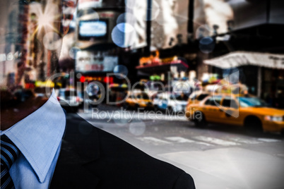 Composite image of businessman standing against white background