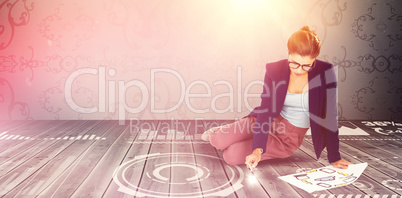 Composite image of full length of businesswoman holding chart with icons