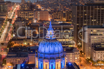Aerial View of San Francisco City Hall at Night with Golden State Warriors Colors.