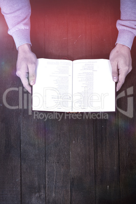 Cropped man holding bible